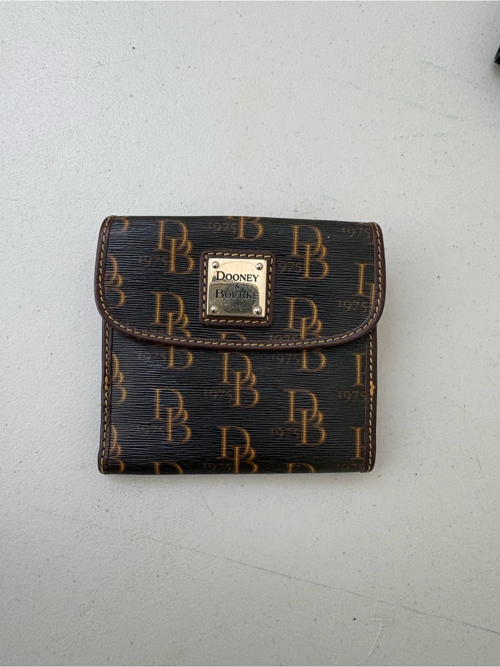 Dooney & Bourke Dark Brown Monogram Fold Wallet with Gold Logo Plate